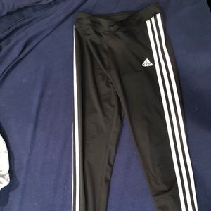Adidas Black triple stripe girls size 14. Worn once.